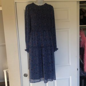 Women’s high neck ruched top dress. Blue floral print new with tags on it.